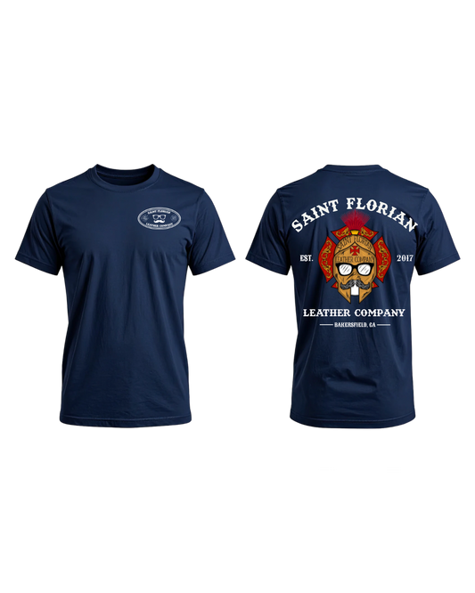 A navy blue short-sleeve t-shirt shown from both the front and back. The front features a small oval logo on the left chest, and the back features a large graphic with the text 'SAINT FLORIAN', 'LEATHER COMPANY', and a detailed skull design.